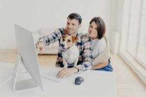 Photo of family couple make shopping on favourite website, enjoy time together