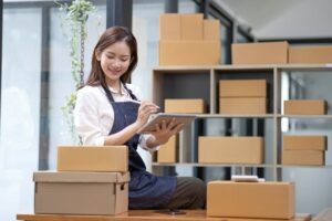 Successful entrepreneur business woman with online sales and Parcel shipping in her home office